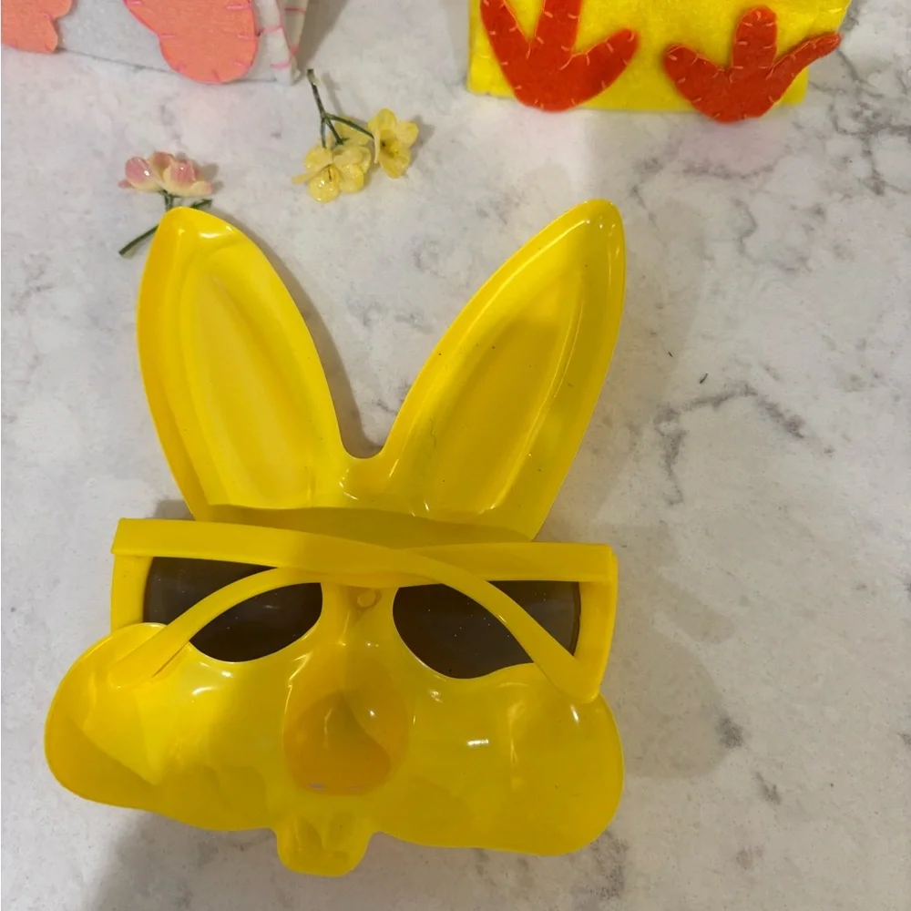 Kids Yellow Bunny Sunglasses and 2 felt bags each with a plastic egg